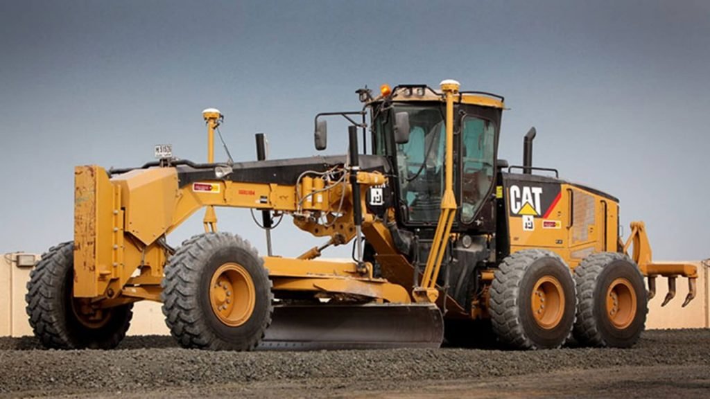 Loadscan solutions supporting earthmoving operations with a motor grader leveling and preparing ground on a construction or mining site.